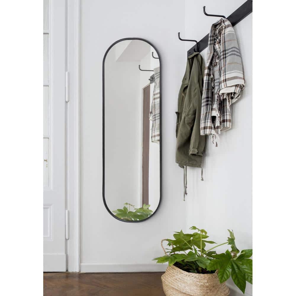 Kate and Laurel Caskill Modern Oval Mirror, 16" x 48", Black, Capsule-Shaped Accent Mirror for Entryway, Living Room, or Bathroom