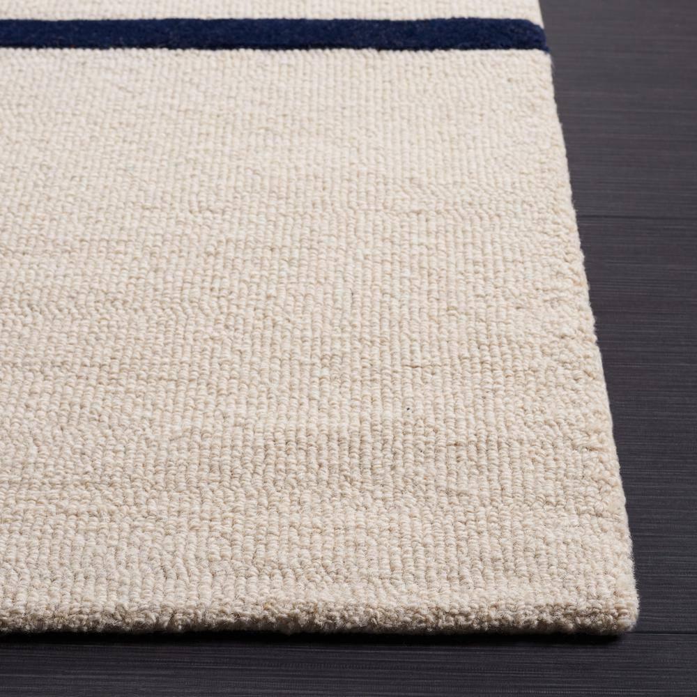 Rodeo Drive RD883 Hand Tufted Indoor Accent Rug - 4'x6' - Beige/Black - Safavieh
