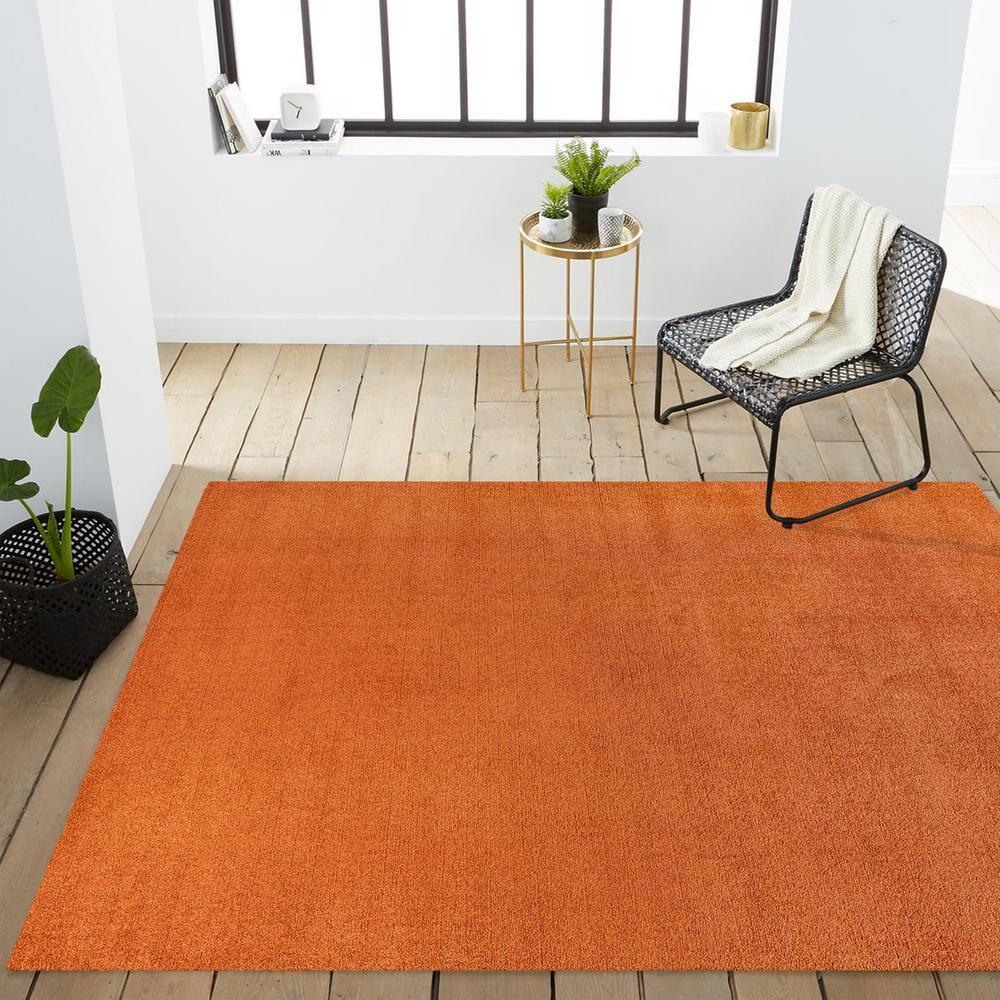 8'x10' Haze Solid Low-Pile Area Rug, Orange - JONATHAN Y