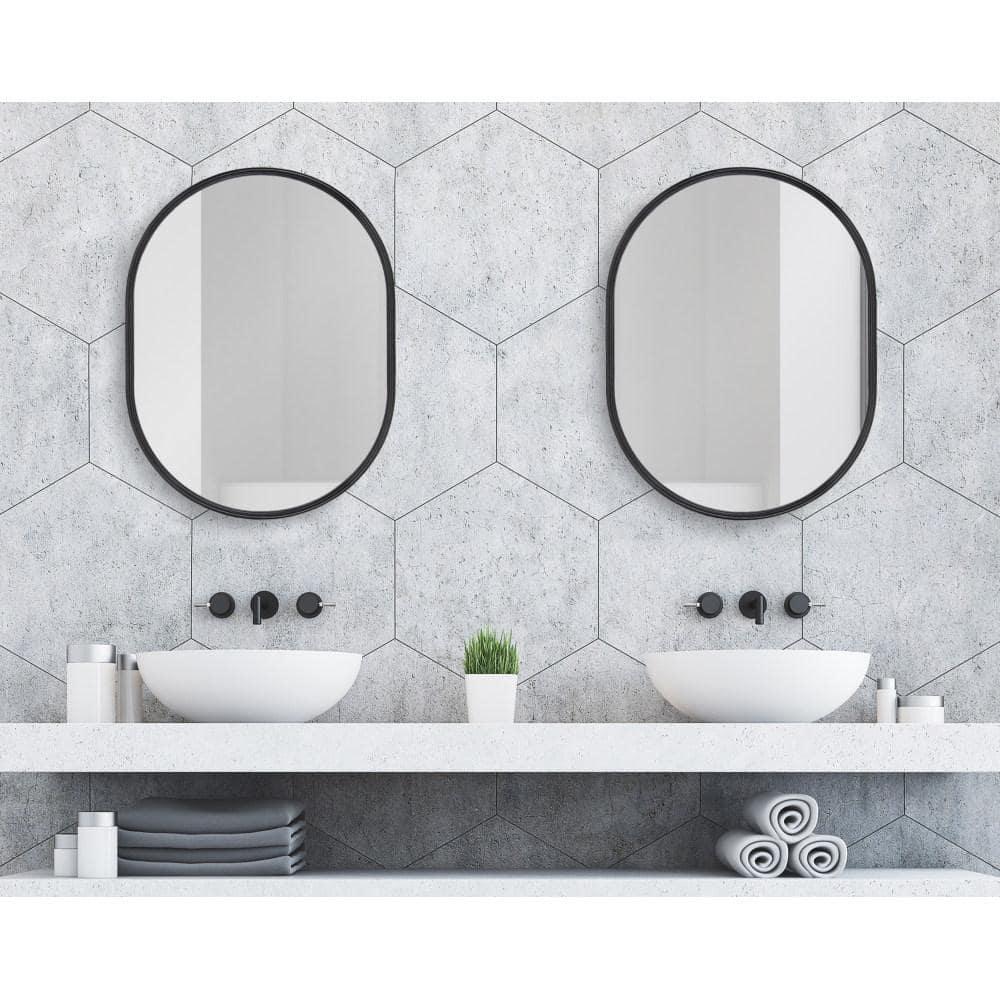Kate and Laurel Caskill Modern Oval Mirror, 18" x 24", Black, Capsule-Shaped Accent Mirror for Entryway, Living Room, or Bathroom