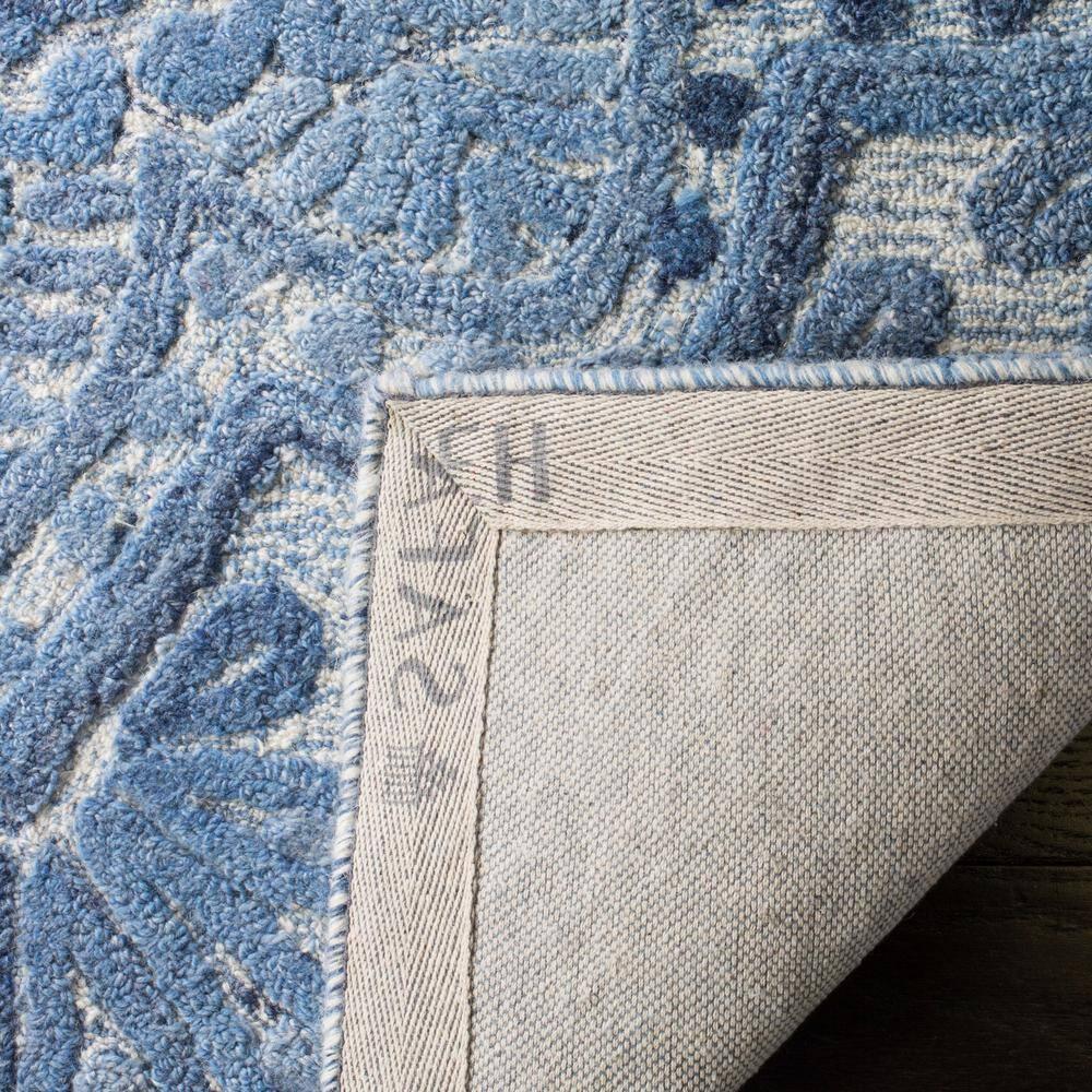 Marquee MRQ110 Hand Tufted Indoor Area Rug - Blue/Ivory - 6' Round - Safavieh