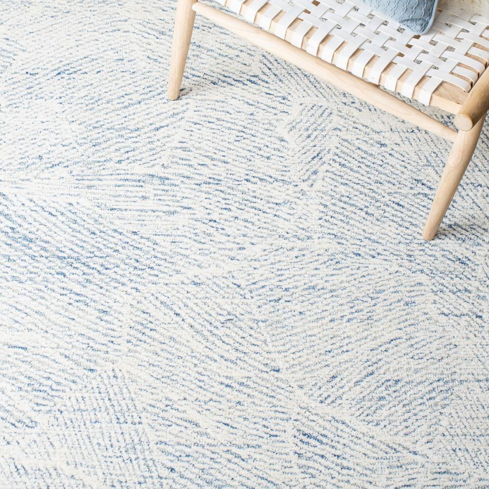 Metro MET999 Hand Tufted Indoor Accent Rug - Blue/Ivory - 3'x5' - Safavieh