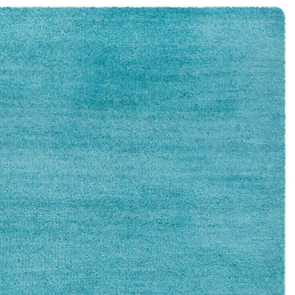 Moreau Hand Tufted Wool Solid Color Rug