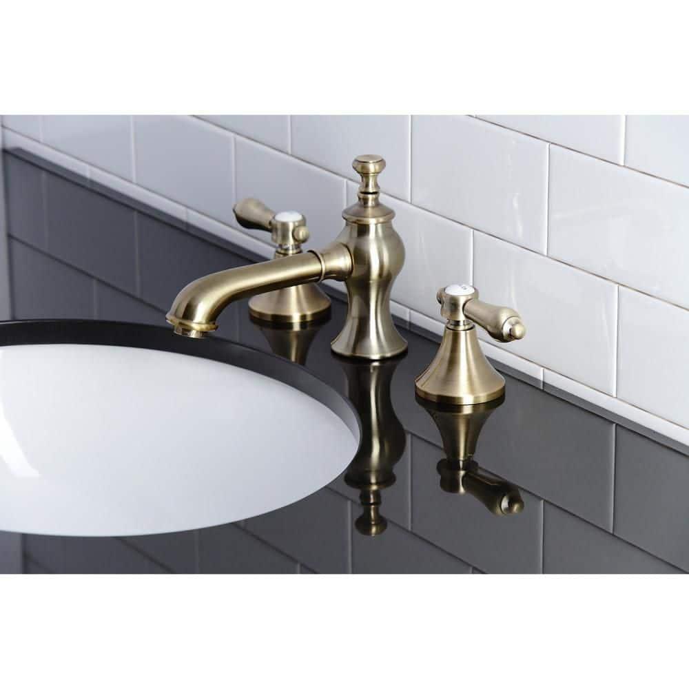 Kingston Brass Vintage Two-Handle 3-Hole Deck Mount Widespread Bathroom Faucet with Brass Pop-Up Drain