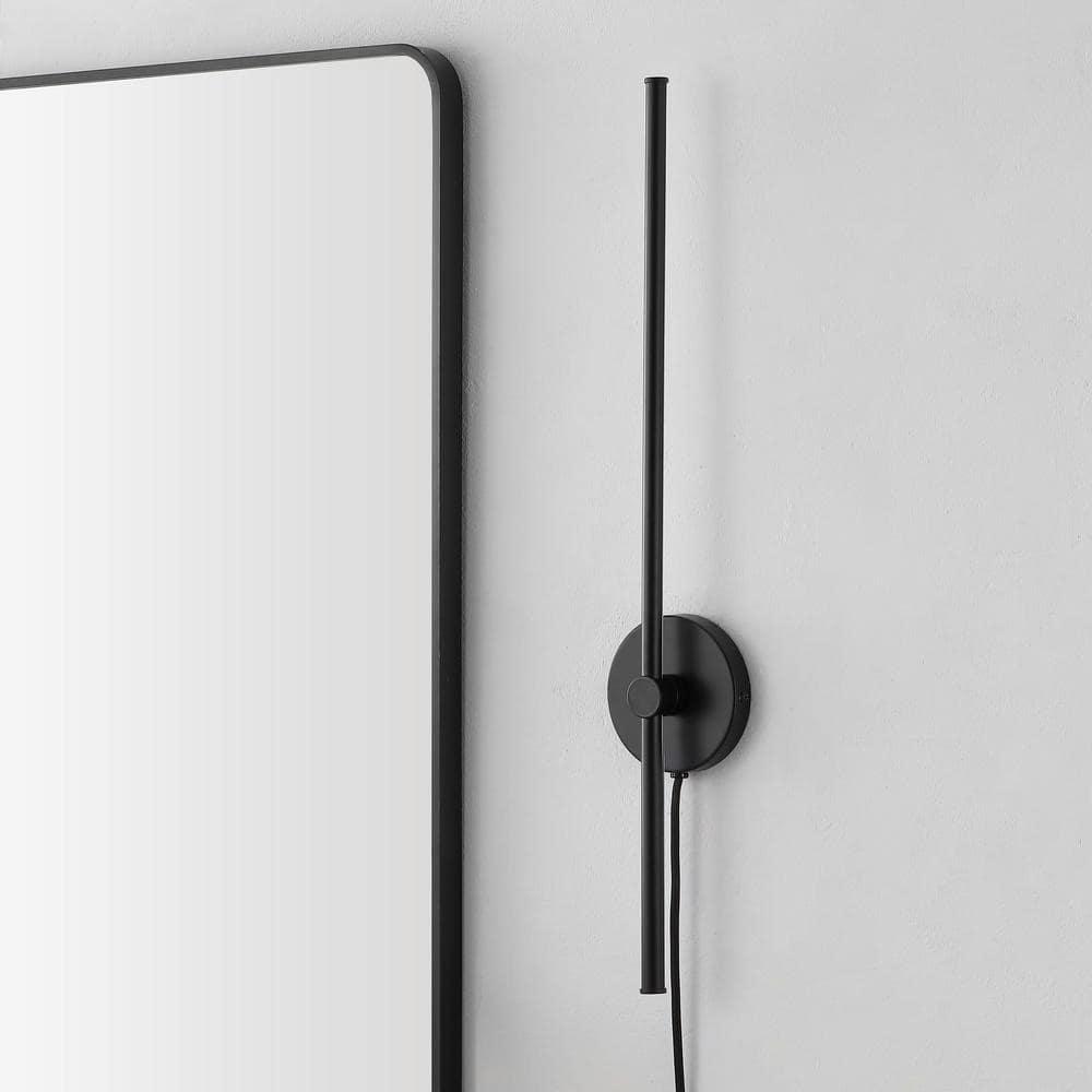 Anton 27.25 in. 1-Light Modern Minimalist Iron Adjustable Bar Integrated LED Plug-In Sconce, Black