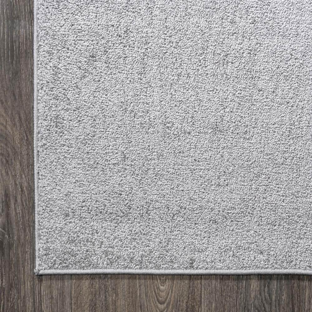 8'x10' Haze Solid Low-Pile Area Rug, Light Gray - JONATHAN Y