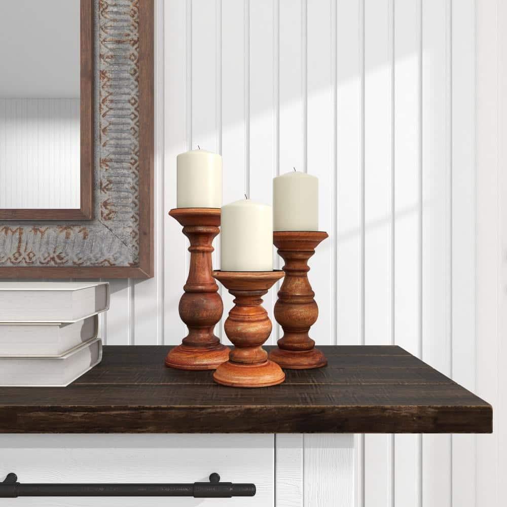 DecMode Traditional and Timeless Mango Wood Pillar Candle Holder Set of 3, 4", 8", 10"H, Brown Finish