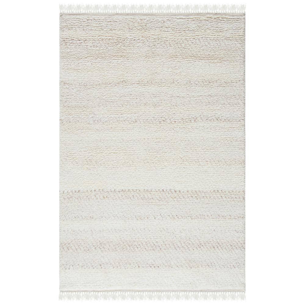 SAFAVIEH Casablanca Carbrey Solid Wool Shag Area Rug, Beige, 4' x 6'