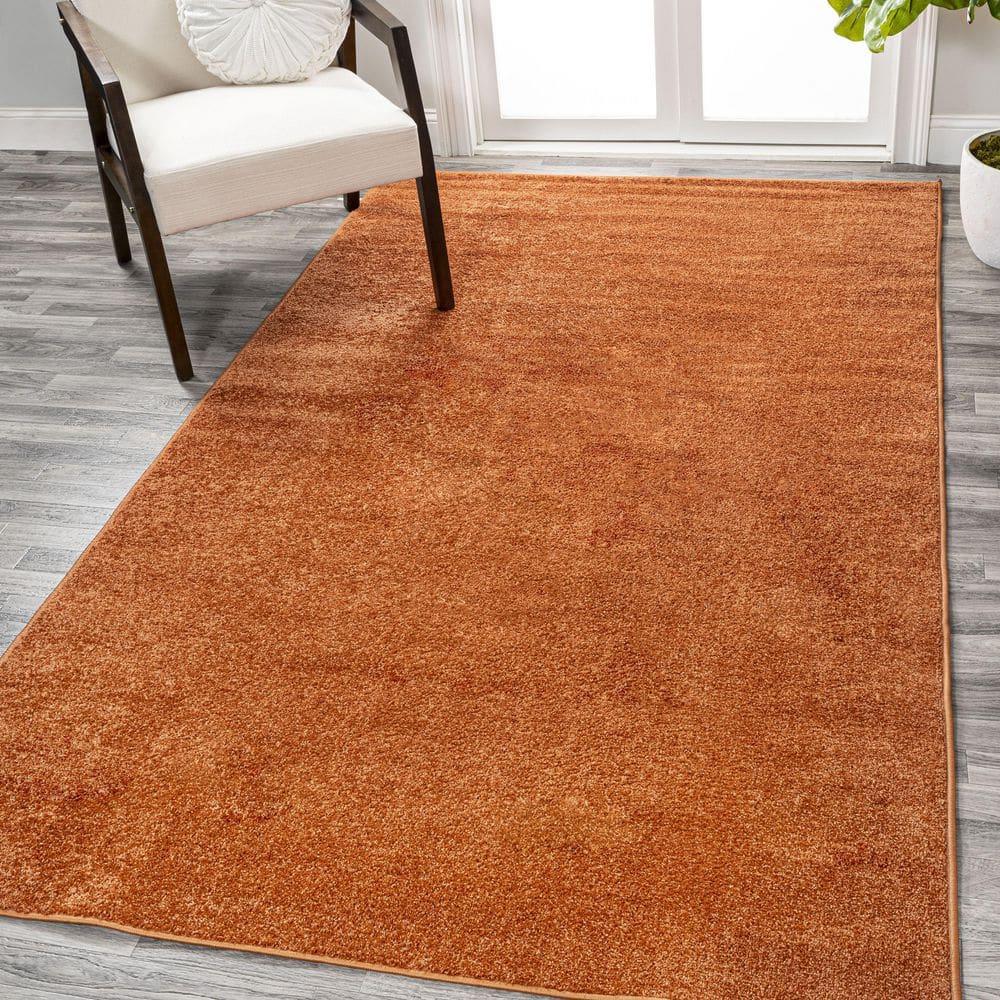 8'x10' Haze Solid Low-Pile Area Rug, Orange - JONATHAN Y