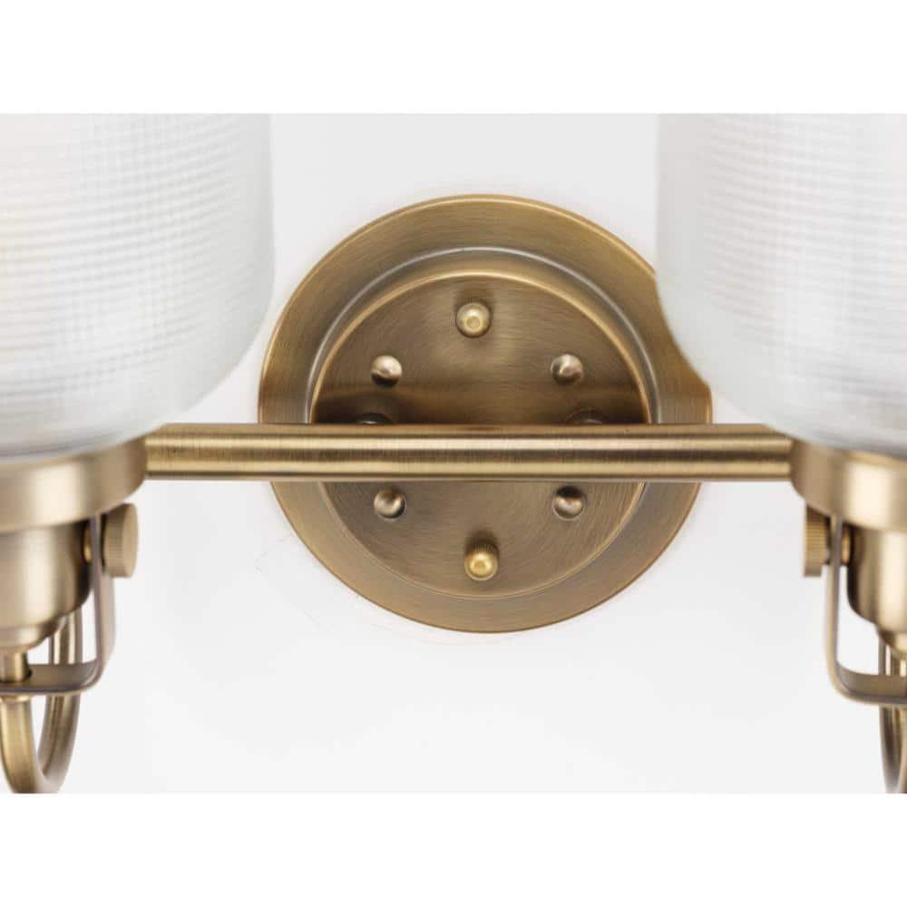 Archie Collection Four-Light Vintage Brass Clear Double Prismatic Glass Coastal Bath Vanity Light