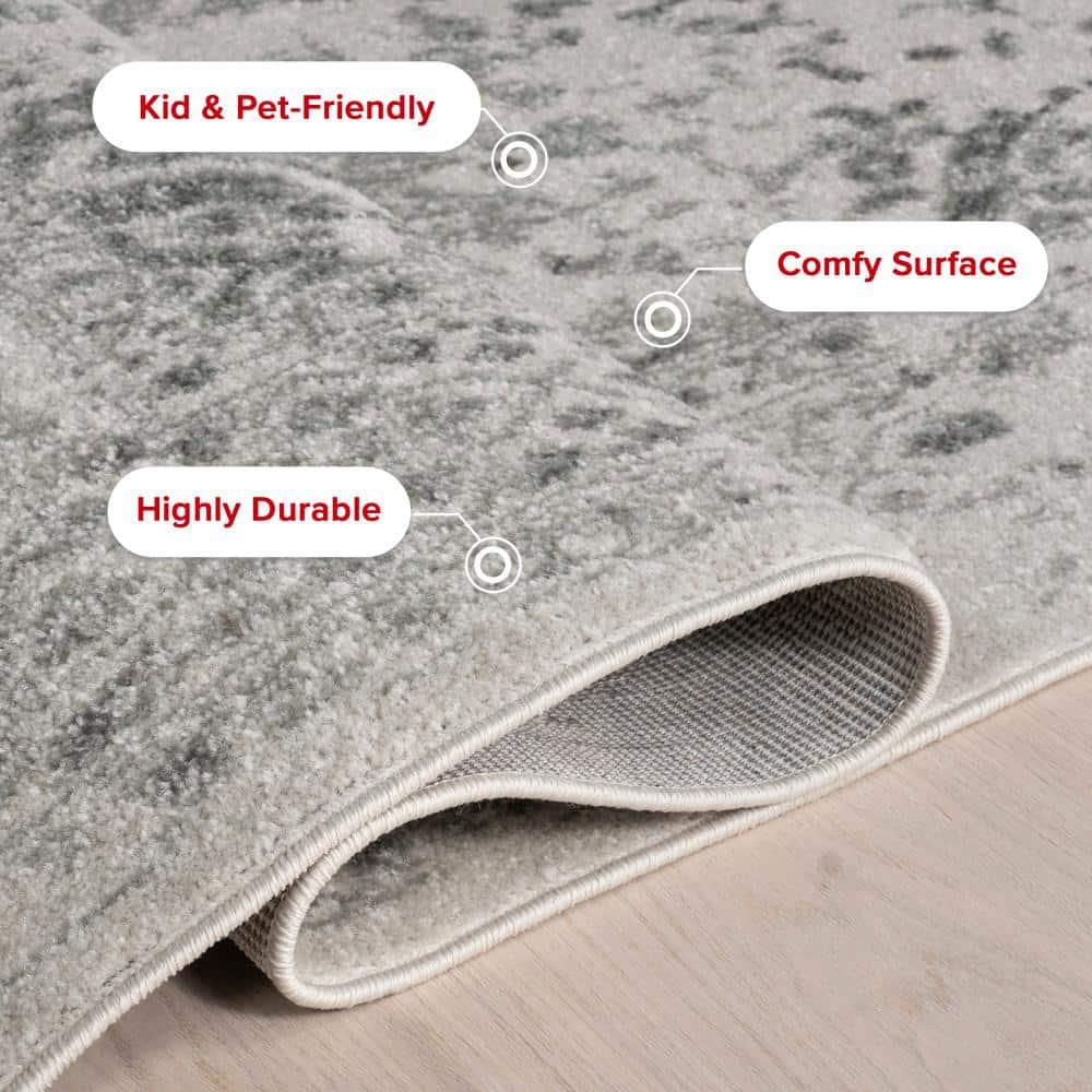 nuLOOM Odell Faded Vintage Ivory 6' 7" x 9' Vintage Area Rug