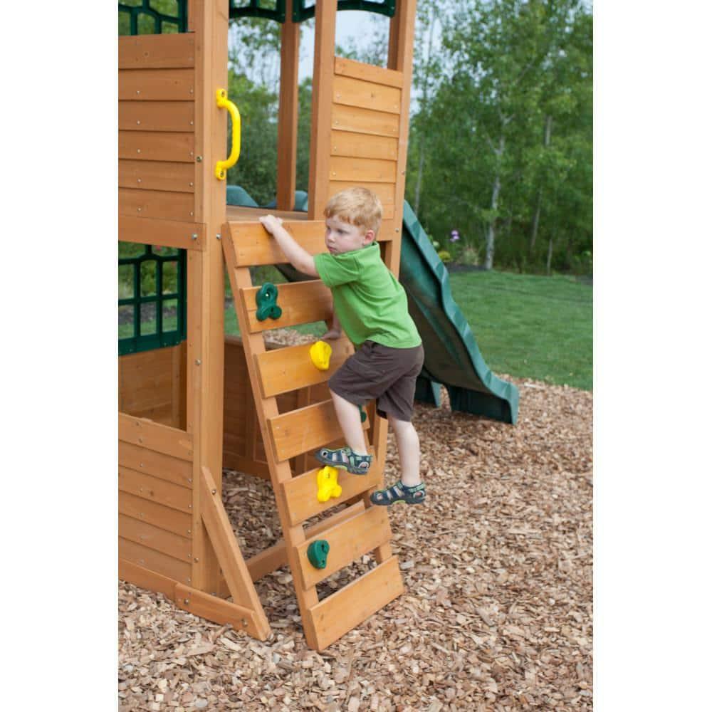 KidKraft Treasure Cove Wooden Swing Set with Slides and Rock Wall