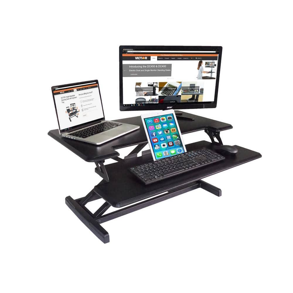 Victor DCX610 Height Adjustable Compact Standing Desk| Black| 33” Wide Sit-Stand Dual Monitor Desk and Laptop Riser Workstation| Compatible with Most Monitor Arms