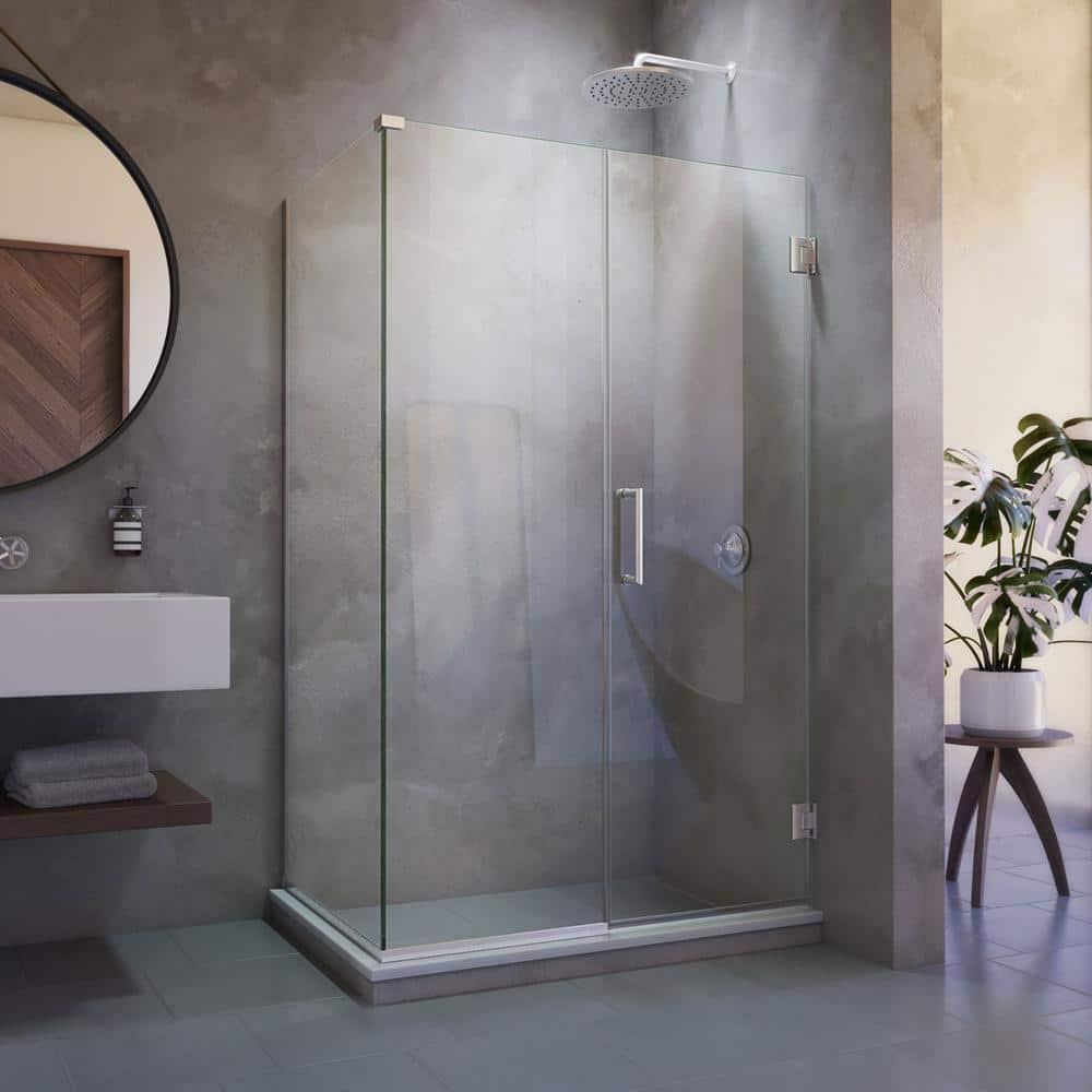 Unidoor Plus Frameless Clear Glass Hinged Shower Enclosure with Distressed Bronze Finish