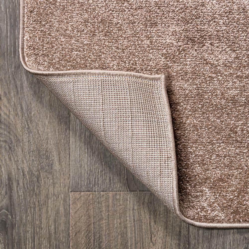 5'x8' Haze Solid Low-Pile Area Rug, Brown - JONATHAN Y