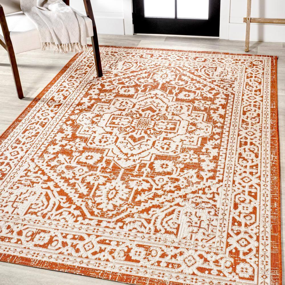 9' x 12' Sinjuri Medallion Textured Weave Indoor/Outdoor Area Rug, Orange/Cream - JONATHAN Y