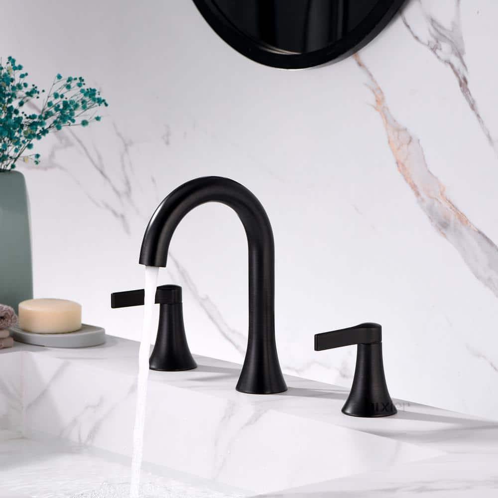 Widespread Bathroom Faucet with Drain Assembly