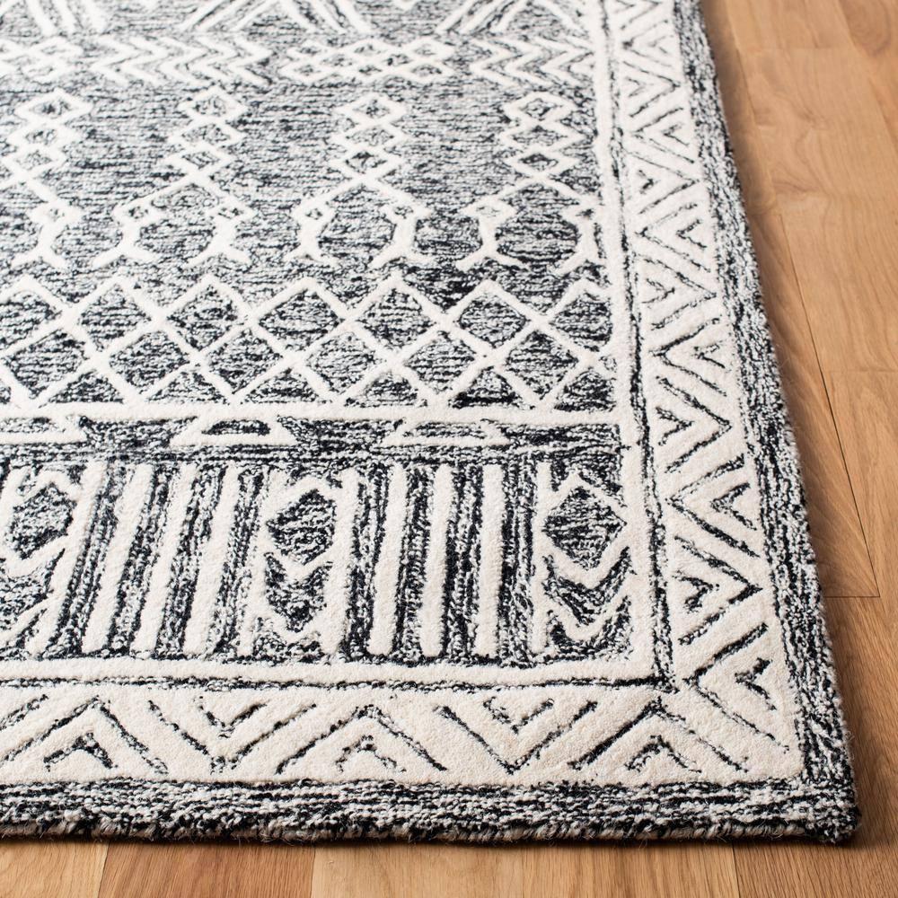 SAFAVIEH Abstract Alastar Geometric Area Rug, Ivory/Black, 9' x 12'