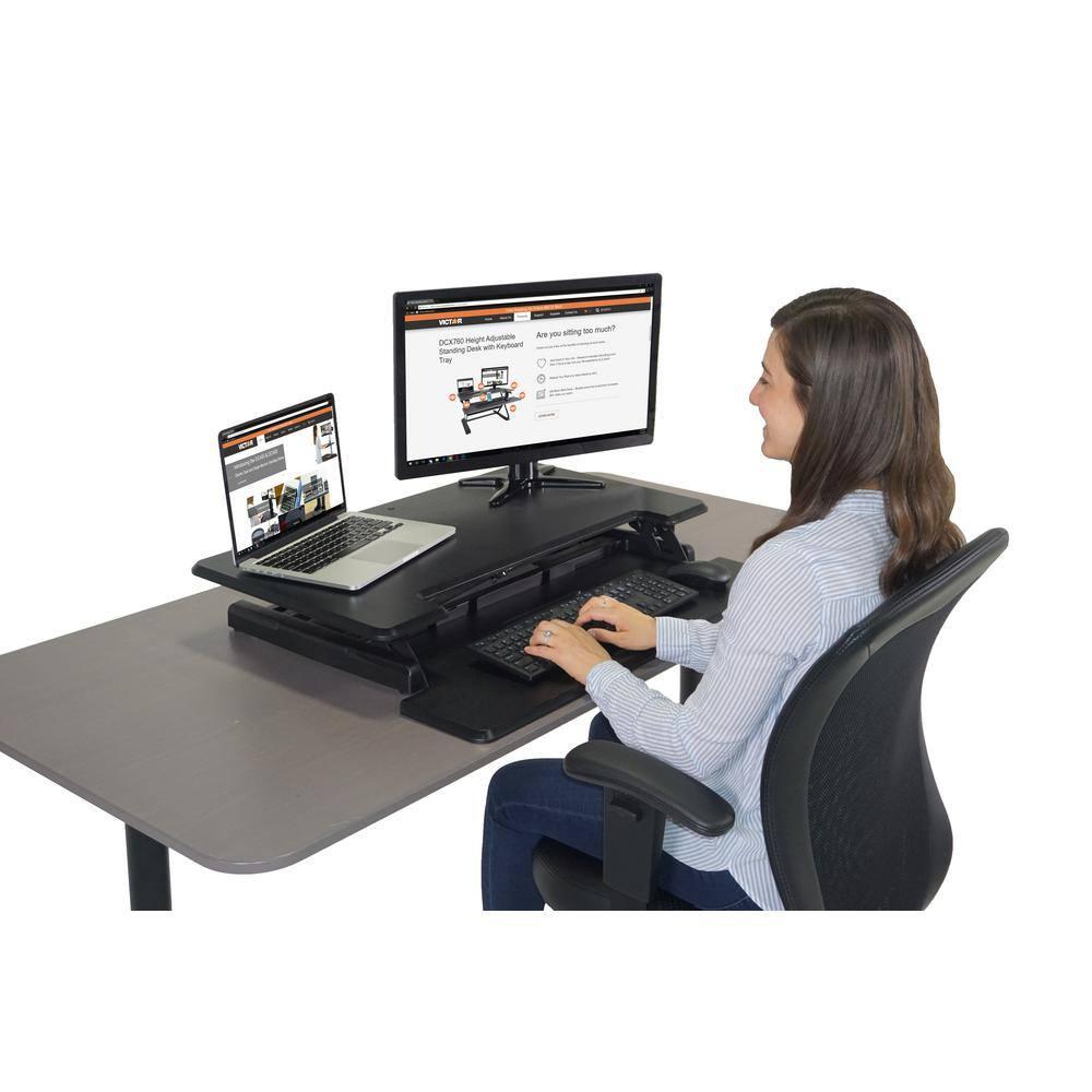 Victor DCX610 Height Adjustable Compact Standing Desk| Black| 33” Wide Sit-Stand Dual Monitor Desk and Laptop Riser Workstation| Compatible with Most Monitor Arms
