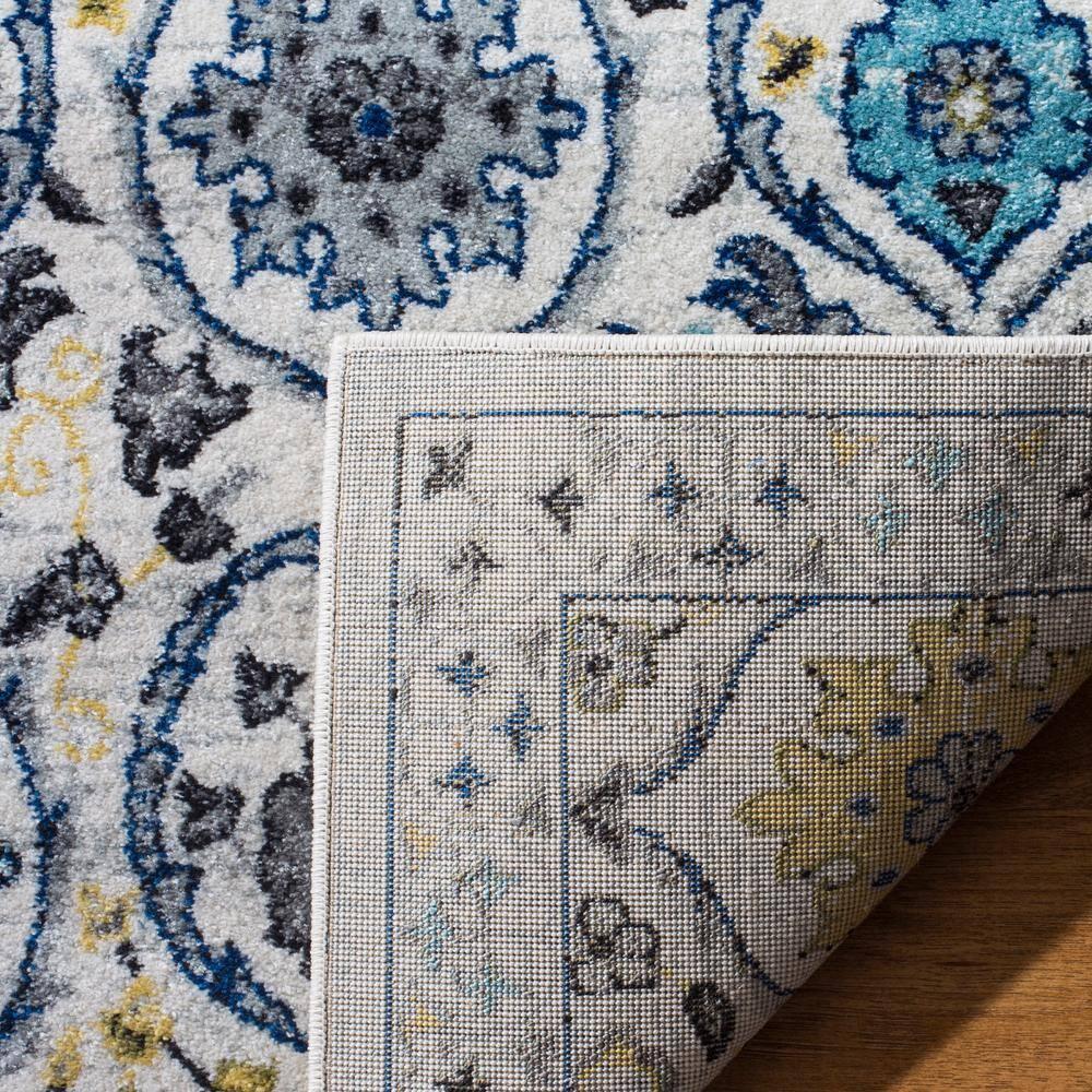 Evoke EVK210 Power Loomed Area Rug - Ivory/Blue - 6'7"x9' - Safavieh.