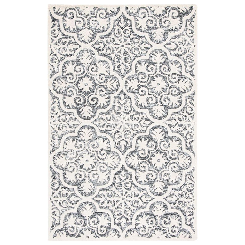 Metro MET859 Hand Tufted Indoor Area Rug - Black/Ivory - 8'x10' - Safavieh