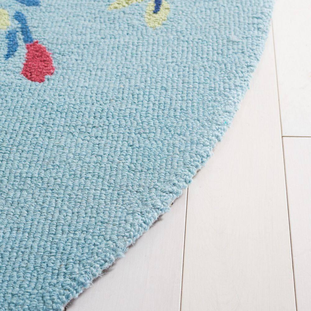 Chelsea HK219 Hand Tufted Area Rug - Blue/Rose - 6'x9' Oval - Safavieh.
