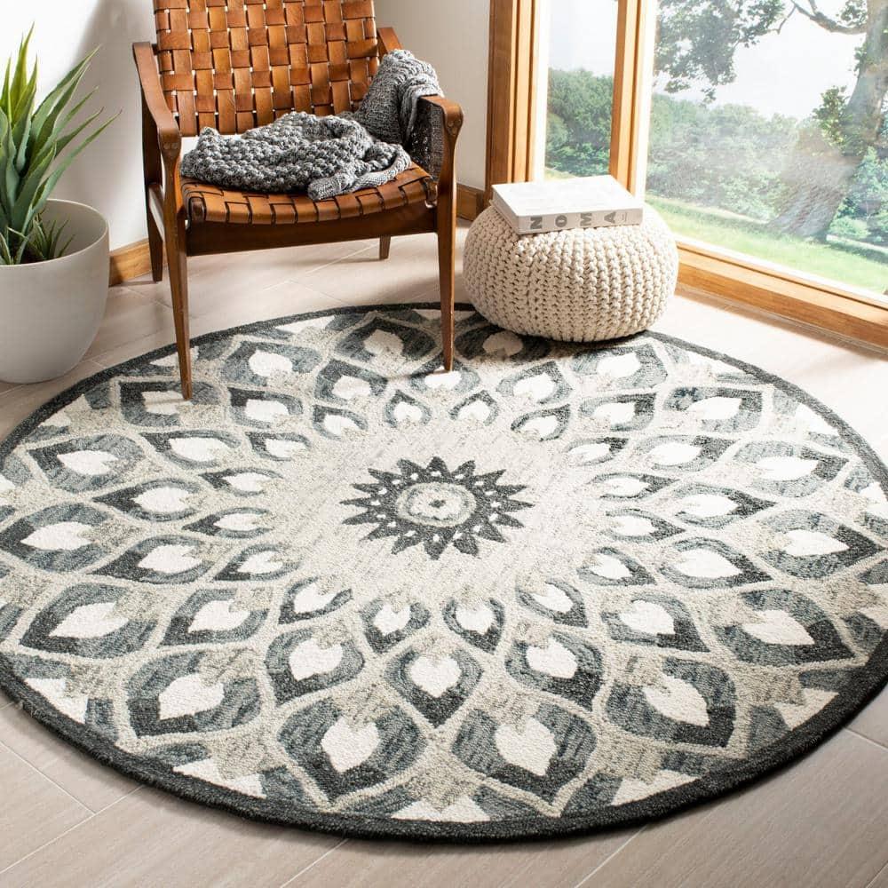 Novelty NOV603 Hand Tufted Area Rug - Charcoal/Ivory - 9' round - Safavieh.