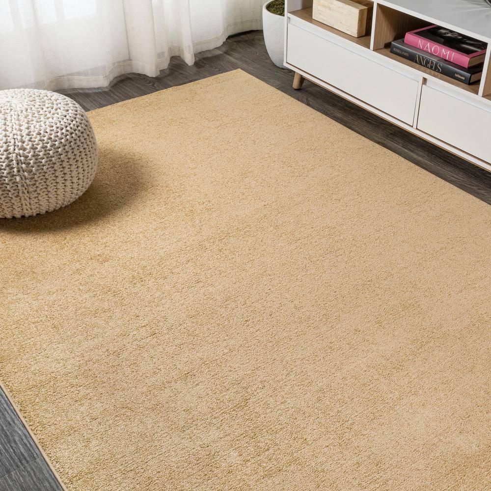 8'x10' Haze Solid Low-Pile Area Rug, Mustard - JONATHAN Y
