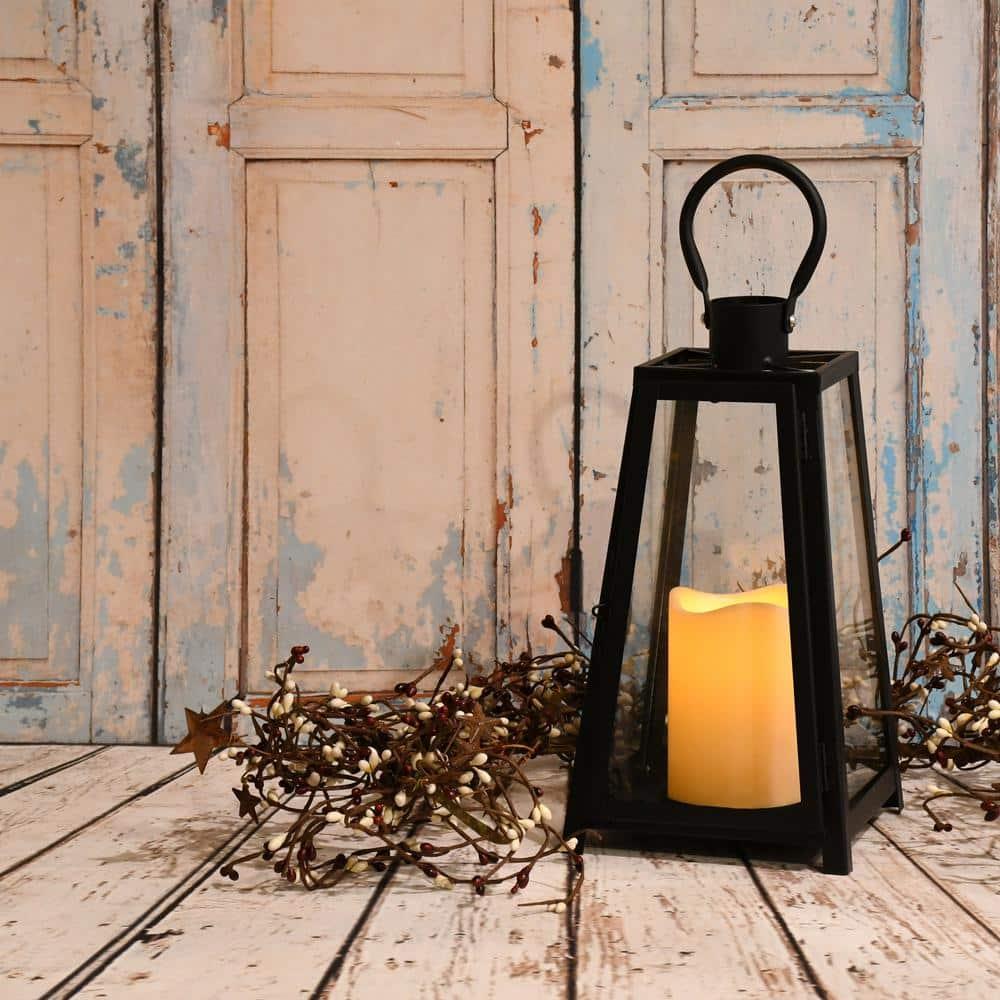 The Holiday Aisle® Black Tapered Metal Lantern with Battery Operated Candle