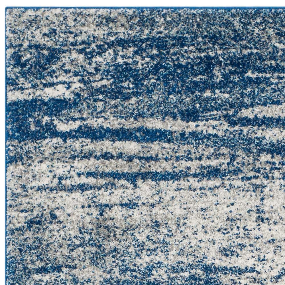 Evoke EVK272 Power Loomed Area Rug Navy / Ivory 6'-7" X 9' - Safavieh.