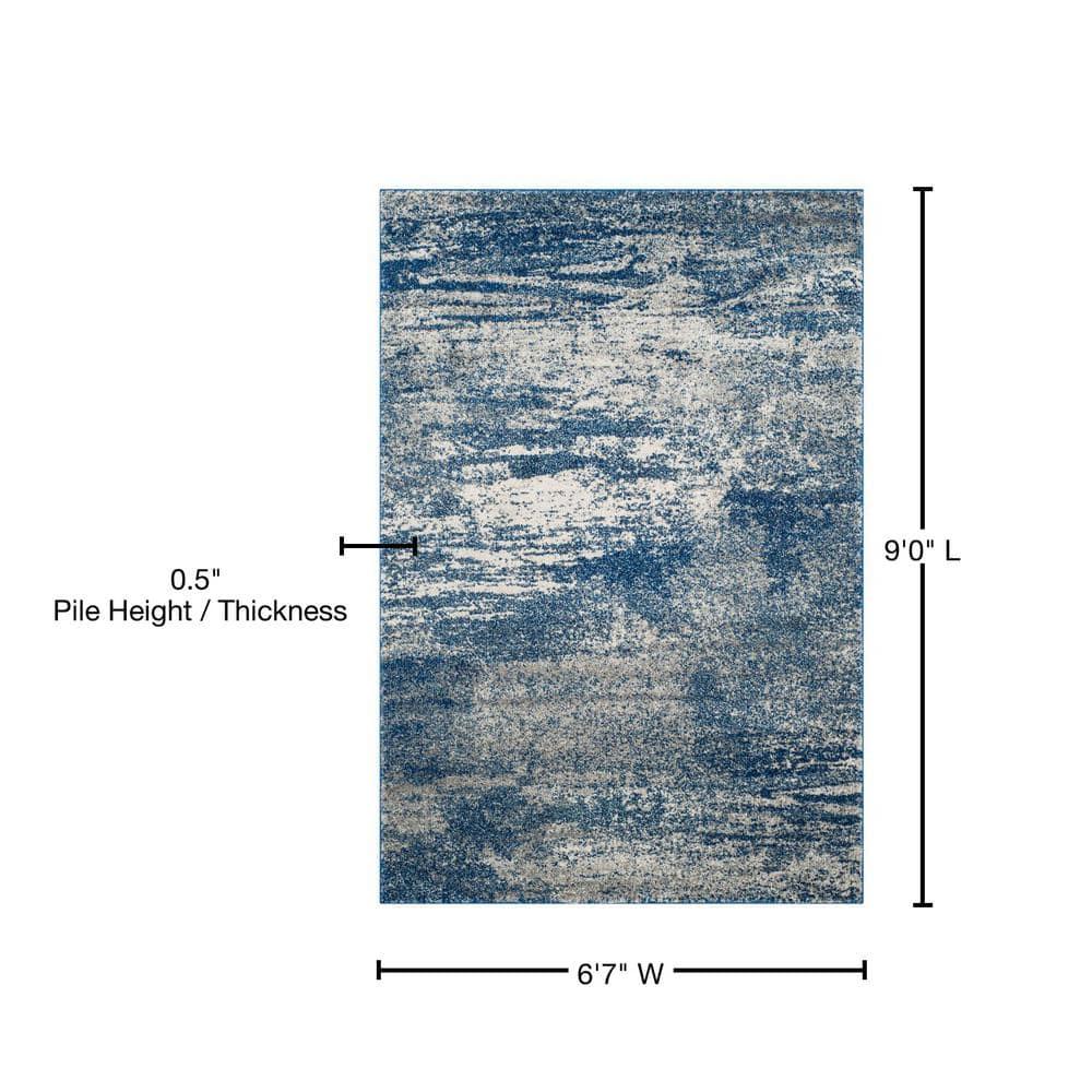 Evoke EVK272 Power Loomed Area Rug Navy / Ivory 6'-7" X 9' - Safavieh.