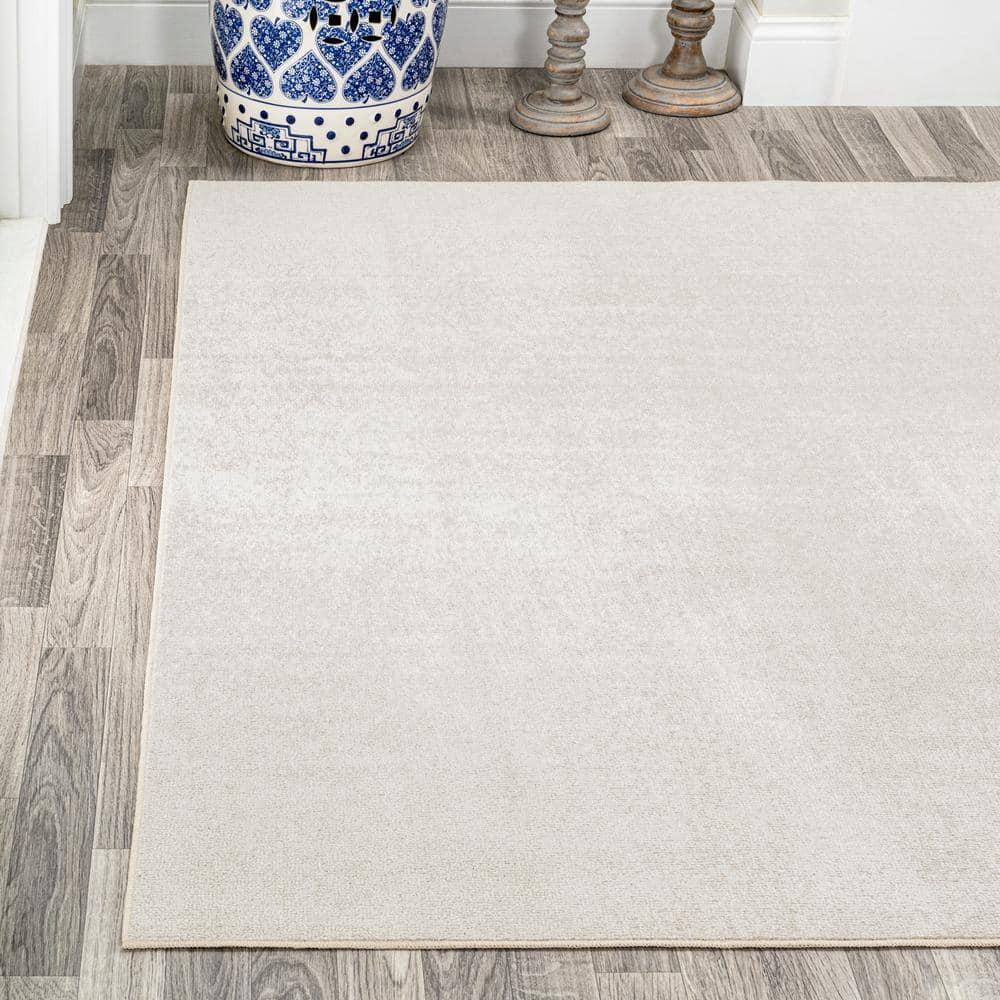 JONATHAN Y Twyla Classic Solid Low-Pile Machine-Washable Cream 4 ft. x 6 ft. Area Rug