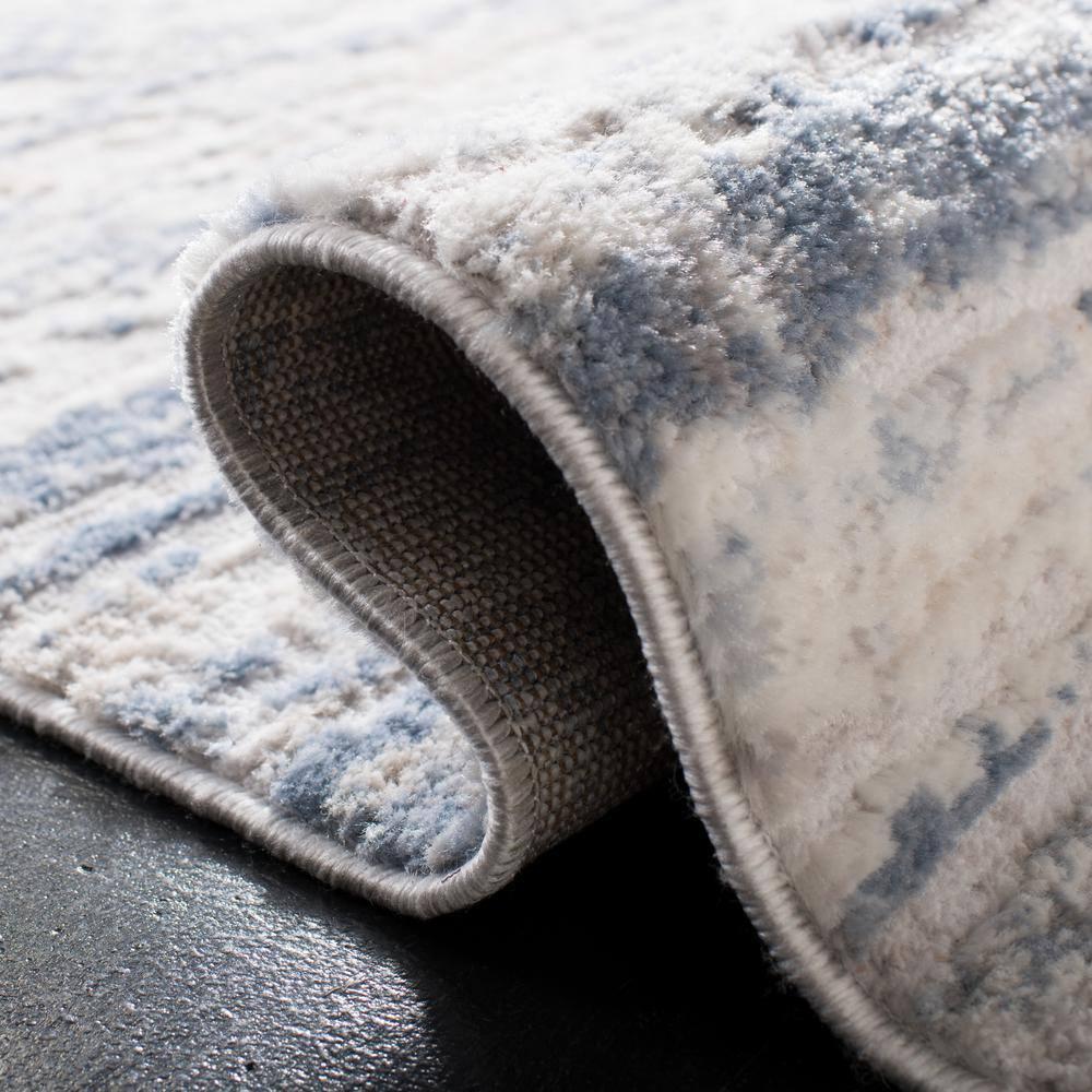 SAFAVIEH Amelia Lester Abstract Area Rug, Ivory/Blue, 2'2" x 4'