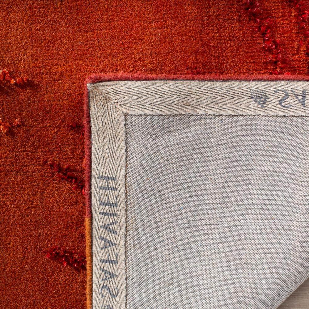 Soho SOH712 Hand Tufted Indoor Area Rug - Rust/Multi - 5'x8' - Safavieh.