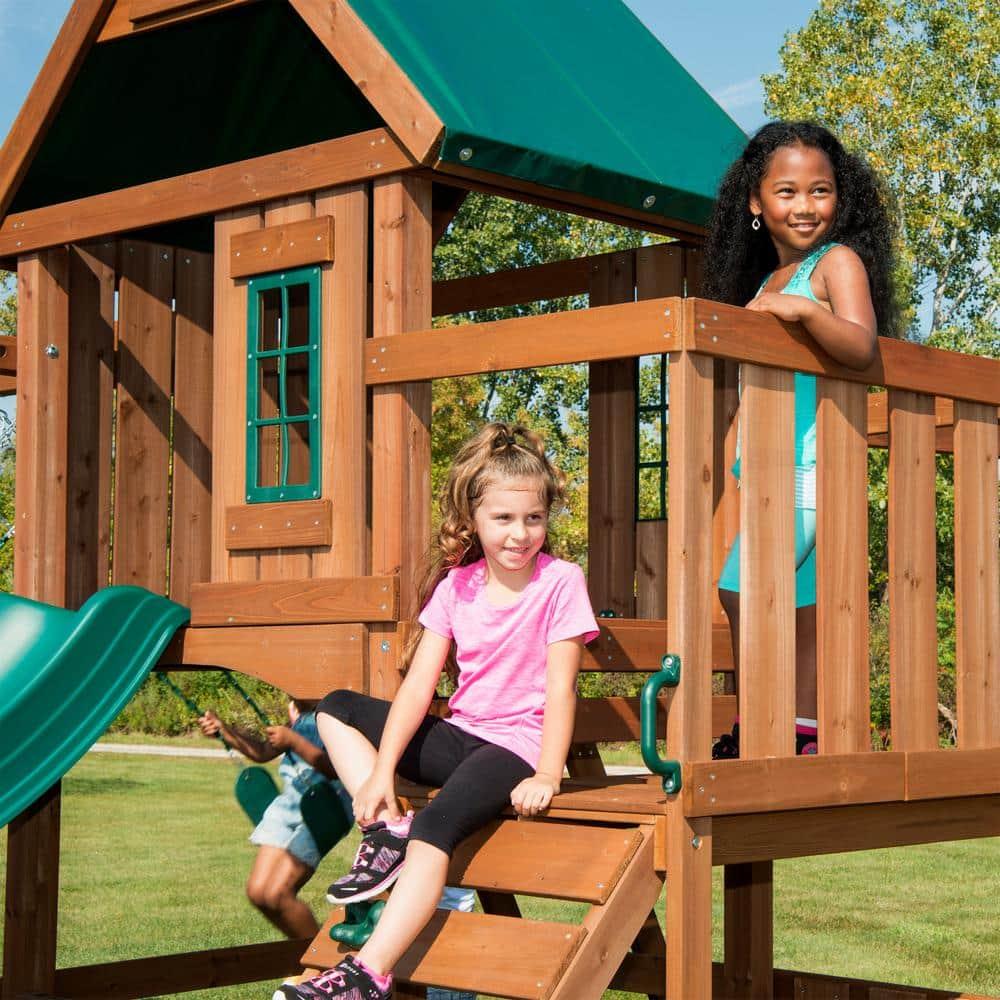 Swing-N-Slide Knightsbridge Wooden Backyard Swing Set with Alpine Wave Slide, Glider Swing, and Rock Climbing Wall