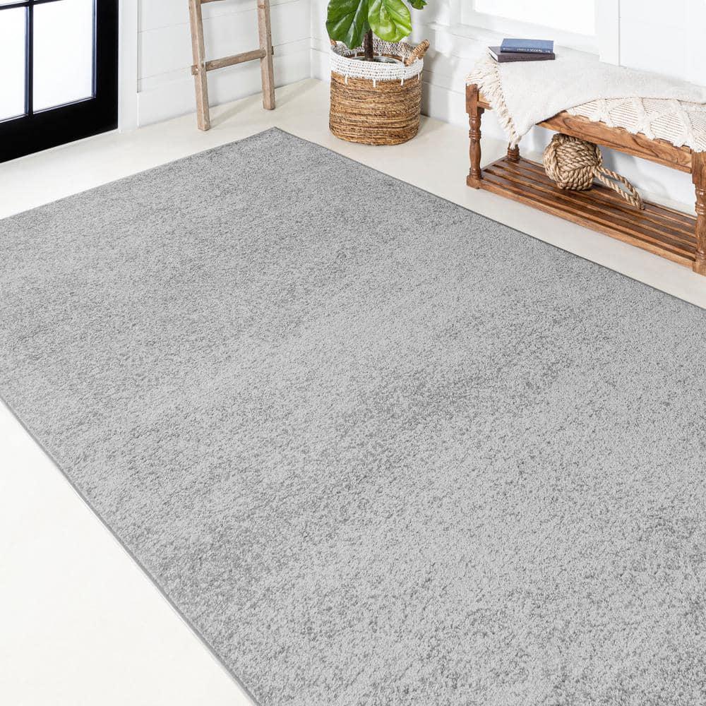 8'x10' Haze Solid Low-Pile Area Rug, Light Gray - JONATHAN Y