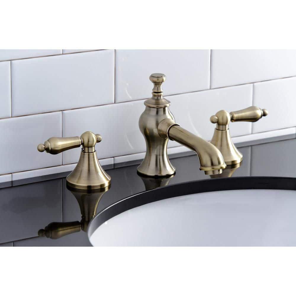 Kingston Brass Vintage Two-Handle 3-Hole Deck Mount Widespread Bathroom Faucet with Brass Pop-Up Drain