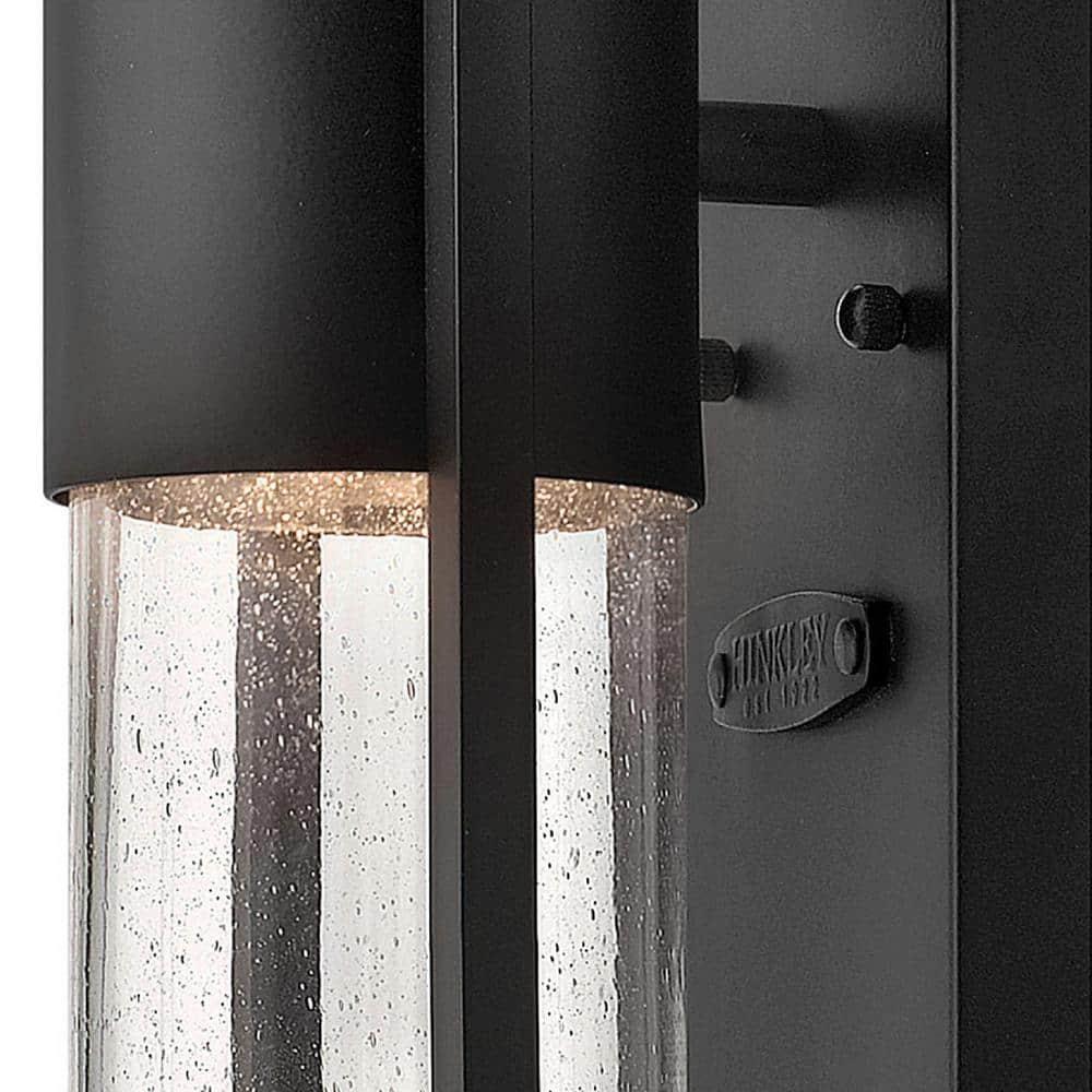 Sleek Black Outdoor Wall Sconce with Clear Seedy Glass
