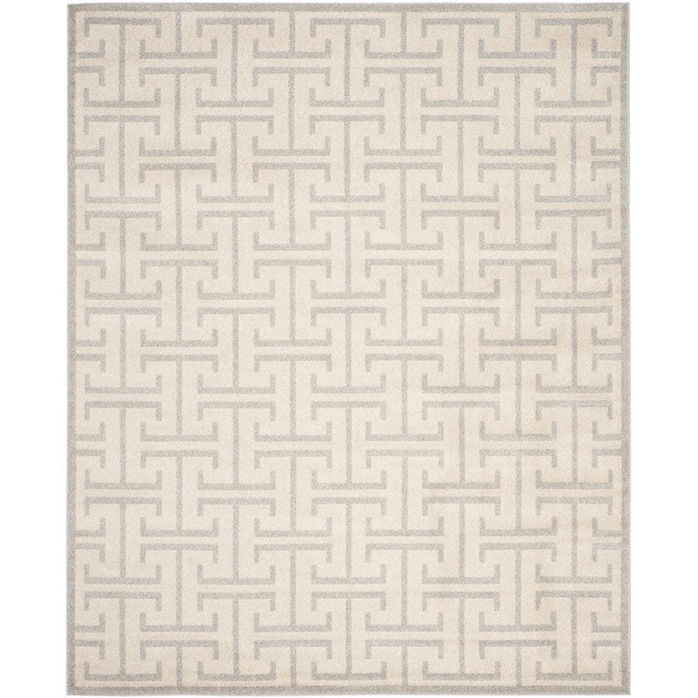 Ivory and Light Gray Rectangular 9' x 12' Synthetic Rug