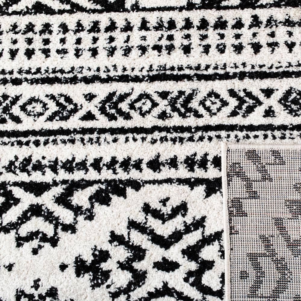 Tulum TUL272 Power Loomed Area Rug - Ivory/Black - 5'3"x7'6" - Safavieh.