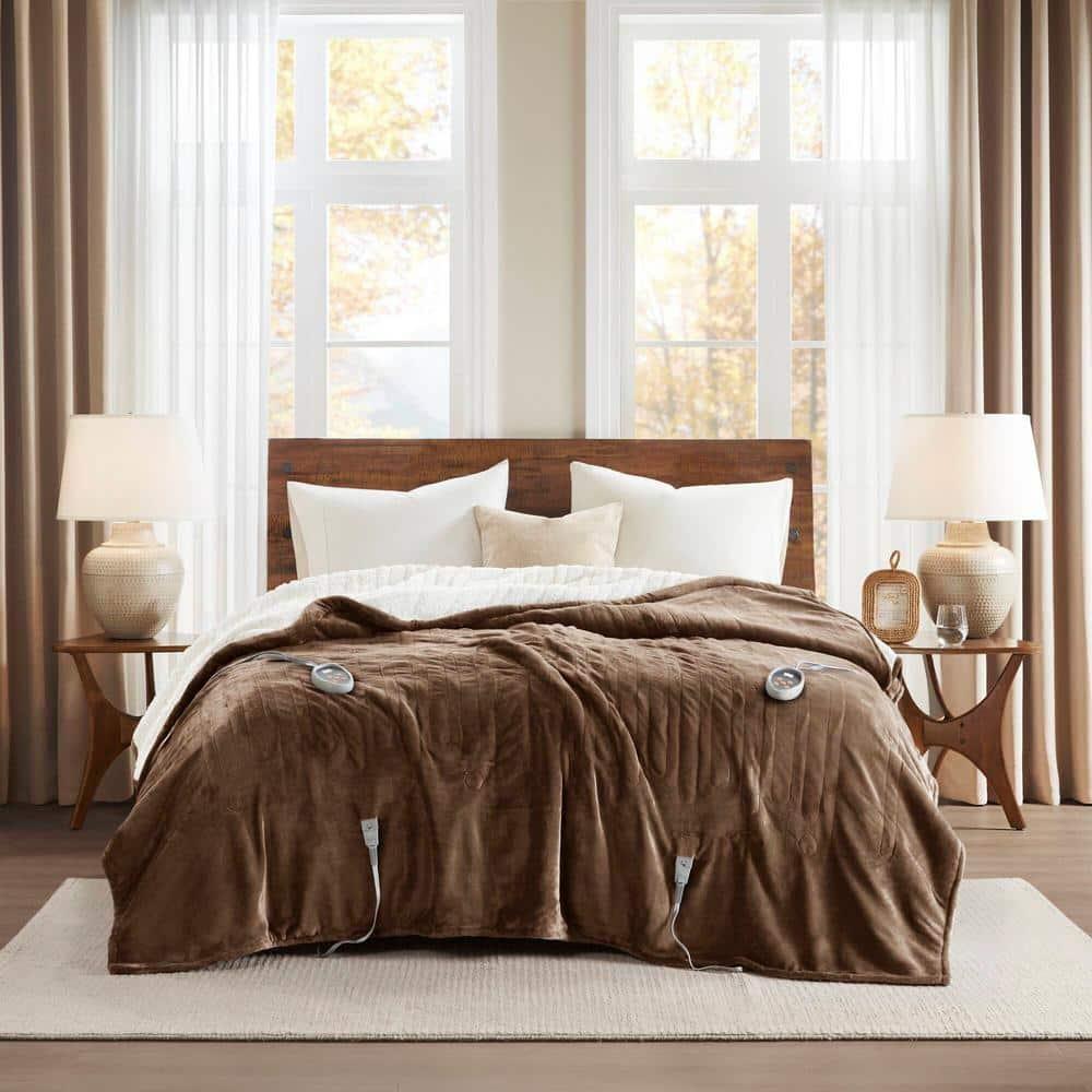 Woolrich Heated Plush to Berber Blanket