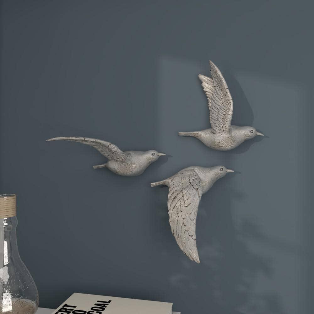 DecMode Silver Polystone Metallic 3D Sculpted Bird Wall Decor (3 Count)