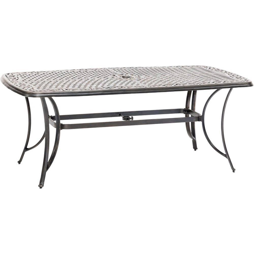 Hanover Fontana 7-Piece Outdoor Dining Set with 2 Sling Swivel Rockers, 4 Sling Chairs, and a 38-In. x 72-In. Cast-Top Table