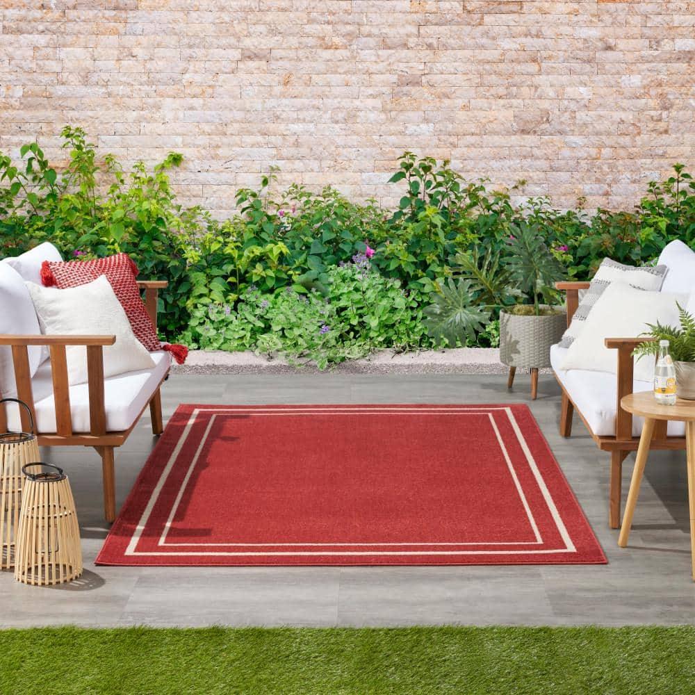 Nourison Essentials Solid Bordered Low Pile Indoor Outdoor Area Rug 5' x 7' Brick/Ivory