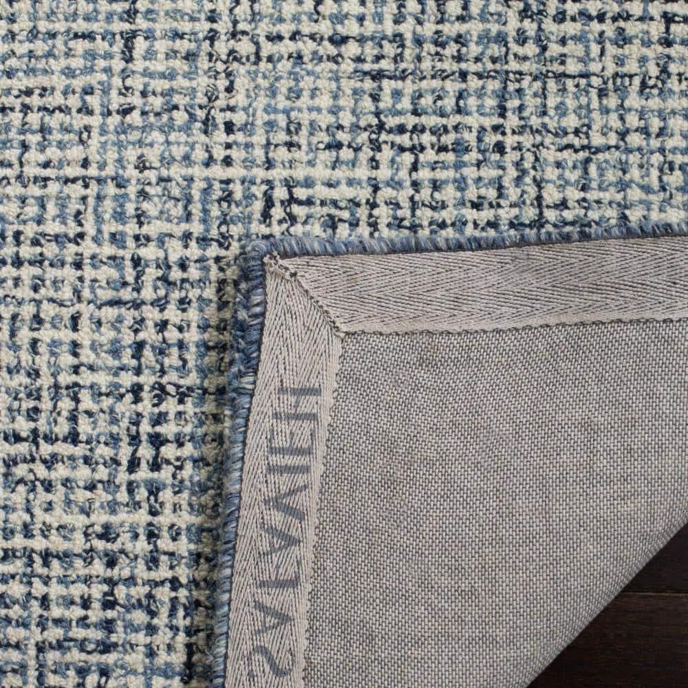 SAFAVIEH Abstract Clive Bordered Wool Area Rug, Navy/Ivory, 5' x 8'