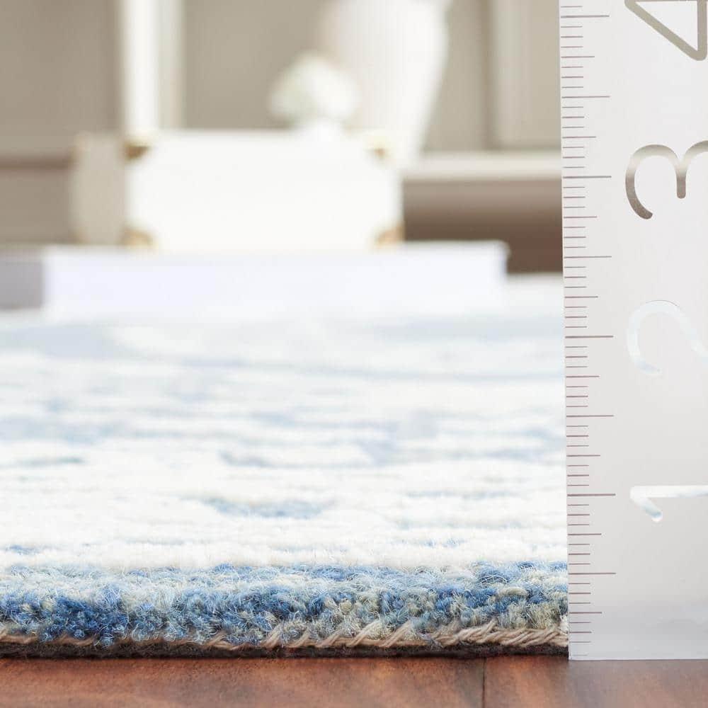 Ebony EBN306 Hand Tufted Indoor Area Rug - Ivory/Navy - 6'x9' - Safavieh