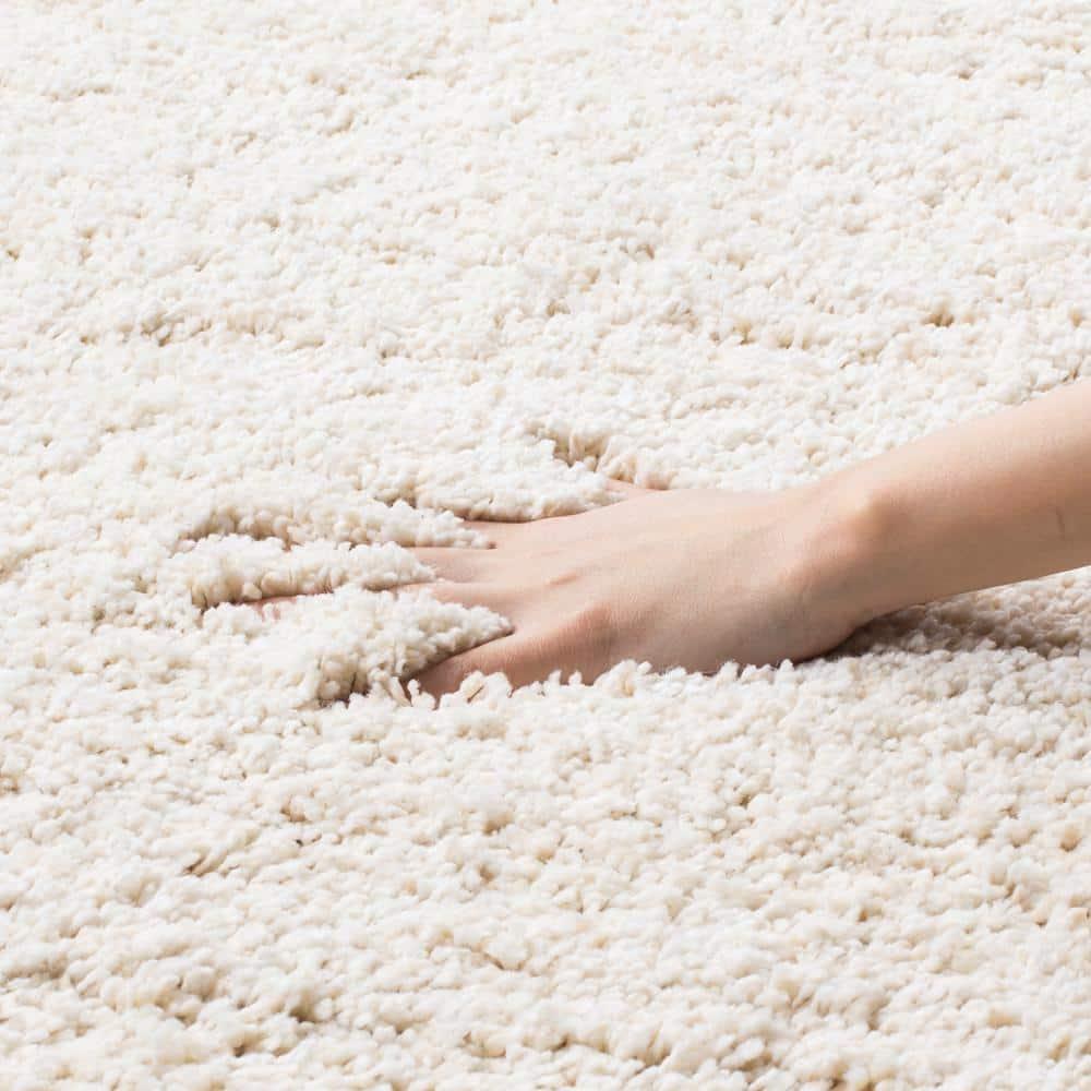 SAFAVIEH Milan Harlow Solid Plush Shag Area Rug, Ivory, 10' x 14'
