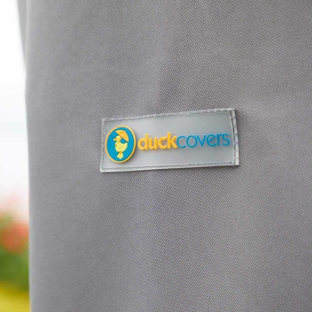 Duck Covers Soteria Waterproof 108 Inch Round Patio Table with Chairs Cover