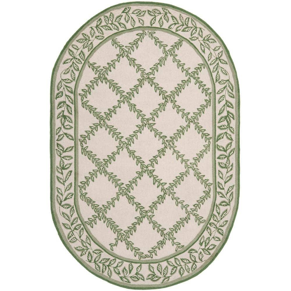 SAFAVIEH Chelsea Alecia Geometric Borders Wool Area Rug, Ivory/Light Green, 4'6"x6'6" Oval