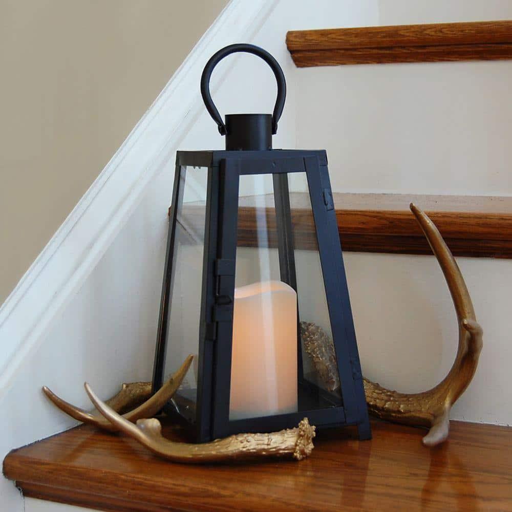 The Holiday Aisle® Black Tapered Metal Lantern with Battery Operated Candle